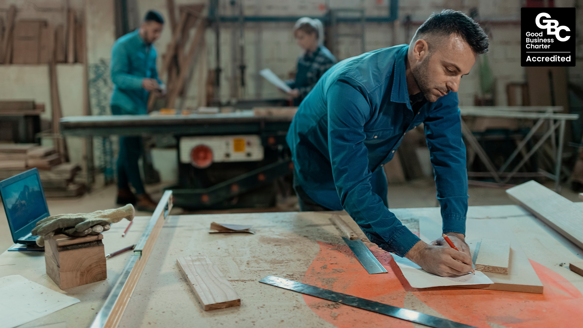 Man working on bench in workshop